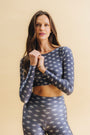 Top cropped manga longa Plume