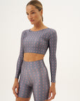 Top cropped manga longa Pétala